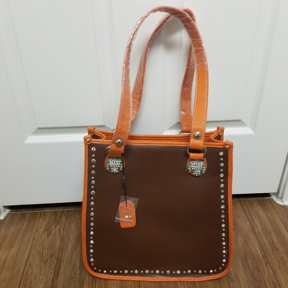 P & G Collection Leather Handbag